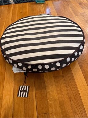 henri bendel Brown and White Polka Dot Round Dog Bed sleeping in stripes